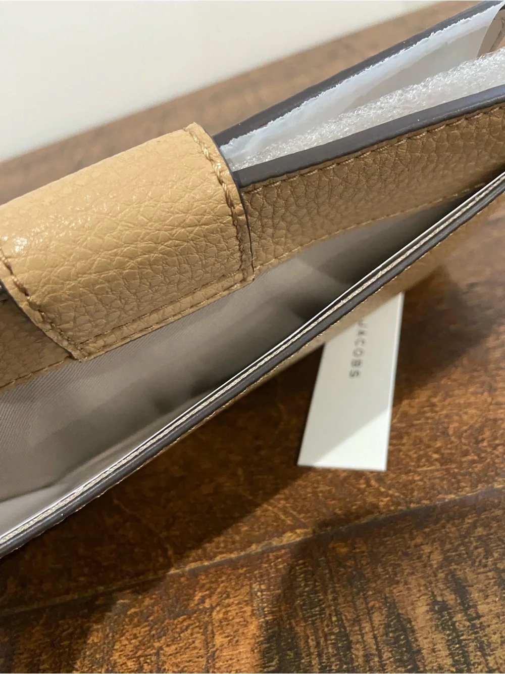 Marc Jacobs Signet Turnlock Slim Wallet in the Color Iced Coffee